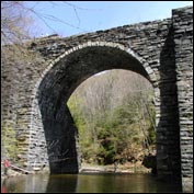 The tall arch bridge